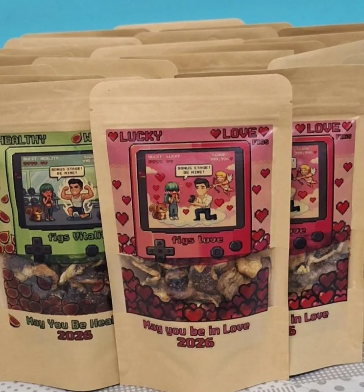 Dried fig pouches with Lucky Love and Healthy game-style festival labels